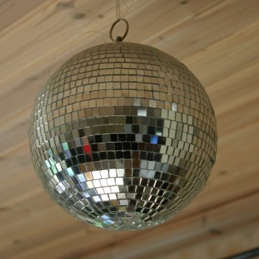 Disco ball hanging from the ceiling for a music discovery article